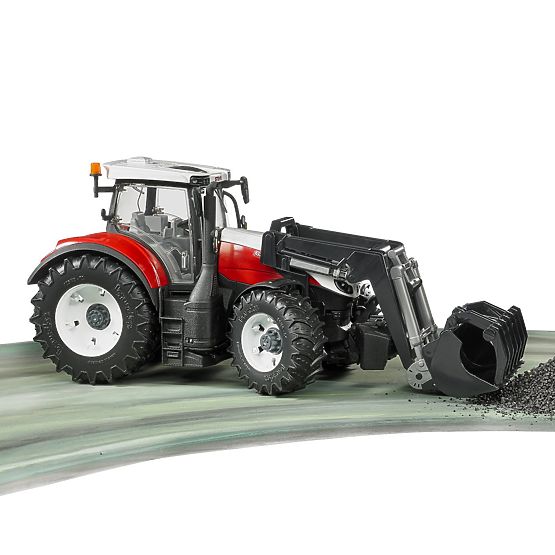 Bruder Steyr 6300 Terrus CVT traktor homlokrakodóval