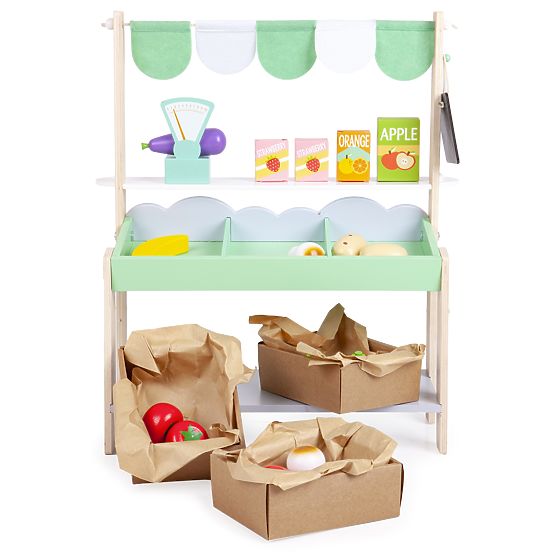 Fa eladó állvány zöldségekkel